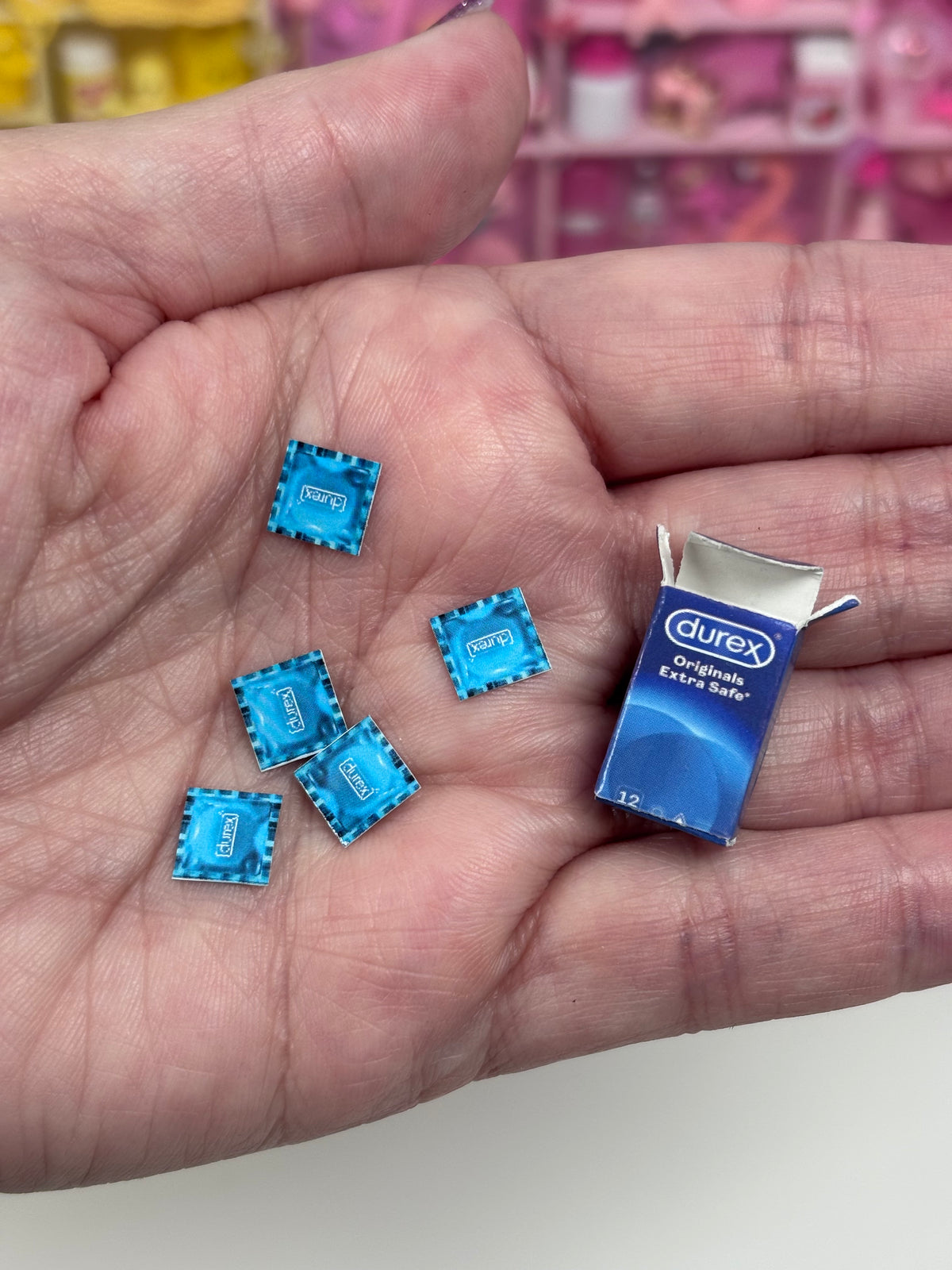 Viral miniature condoms - Dollhouse